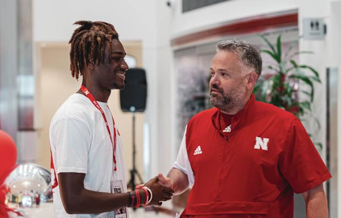 Evan Taylor with Nebraska head football coach Matt Rhule